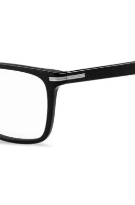 Montura para gafas graduadas de acetato negro con detalle metálico plateado de la marca