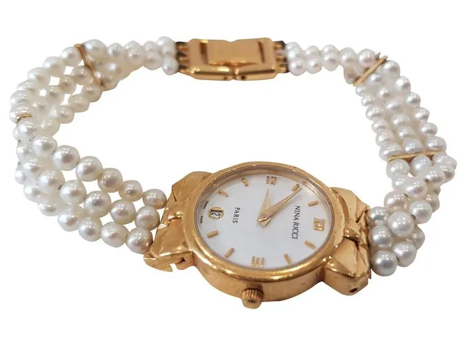 Nina Ricci Relojes finos Dorado 