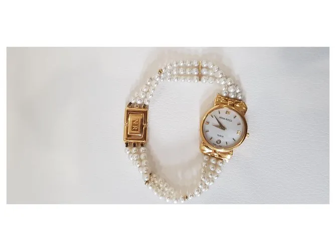 Nina Ricci Relojes finos Dorado 