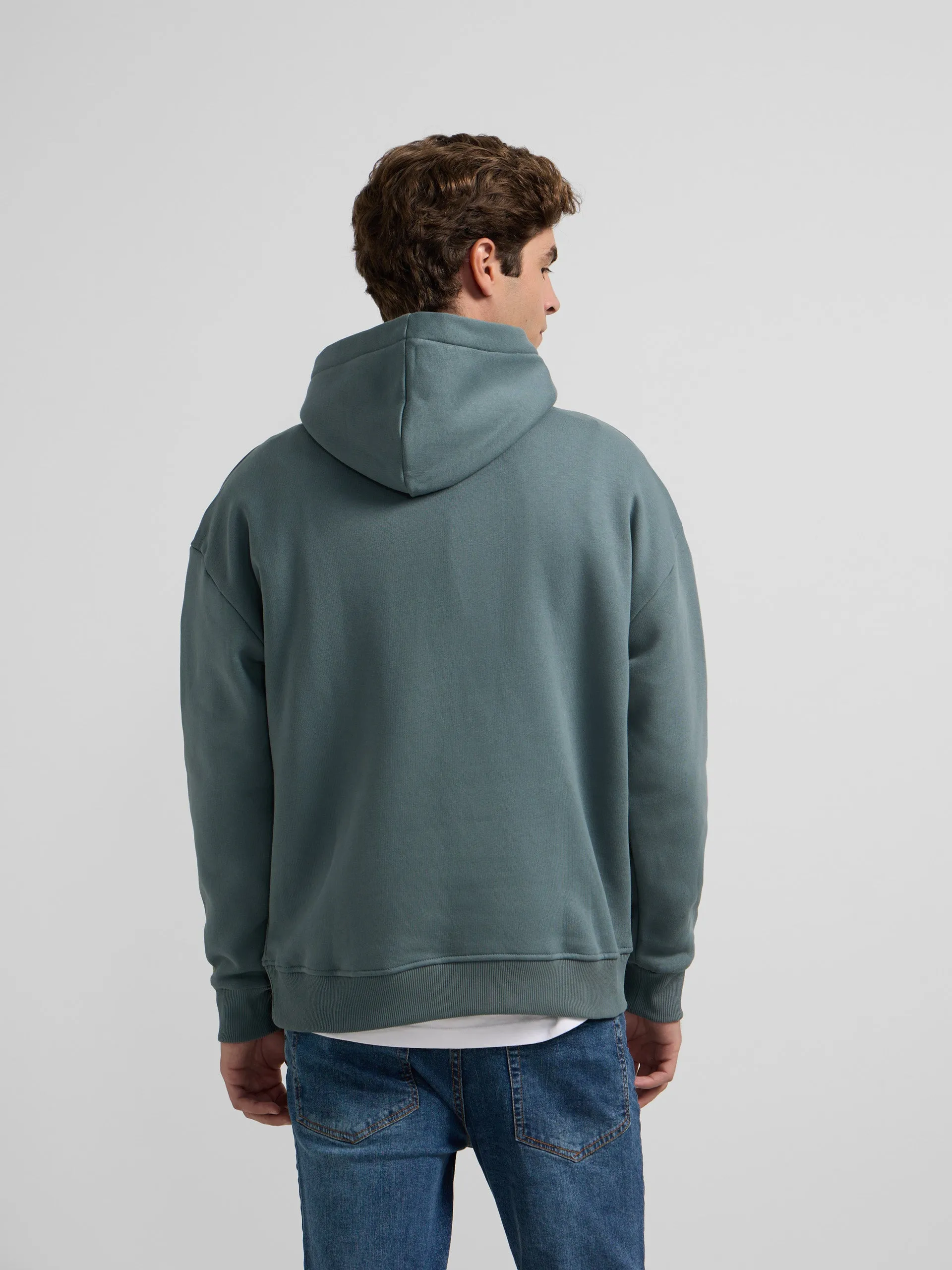 Sudadera capucha relaxed fit claim petroleo